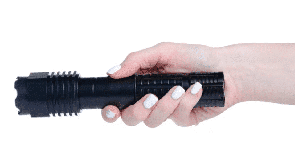Holding Flashlight TASER Stun Gun